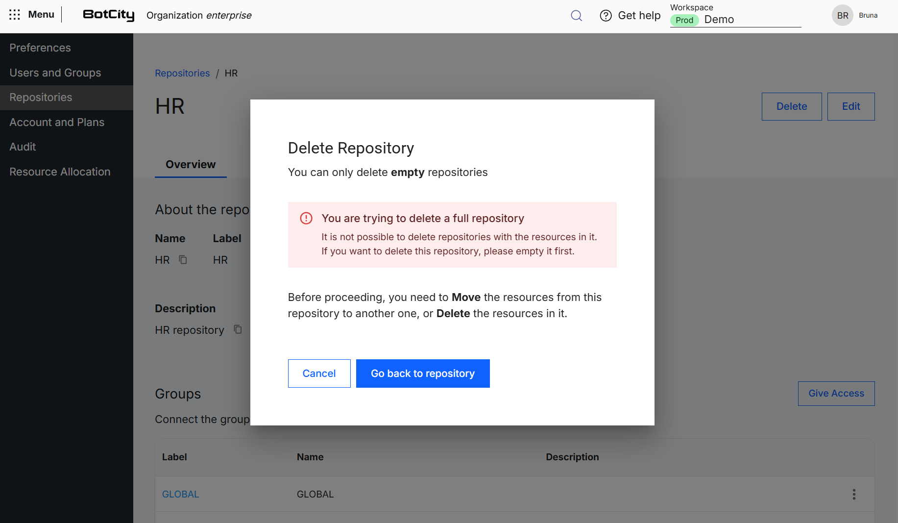 Blocked deletion of a repository with resources Screenshot of the BotCity Platform, on the information screen of the HR repository, with the "Delete Repository" window open, informing that only empty repositories can be deleted, showing the red alert "You are trying to delete a full repository", the guidance to move or delete the repository resources before proceeding and the Cancel and Go back to repository buttons.